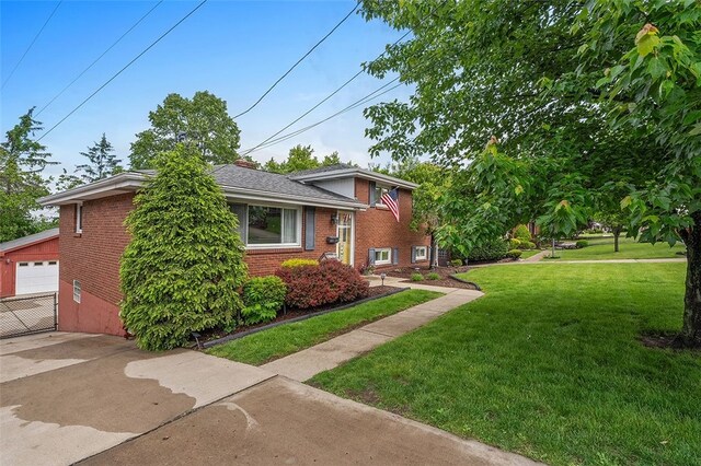 1426 Raven Dr, Pittsburgh, PA 15243 - view of property exterior with brick siding, a yard, and an outdoor structure