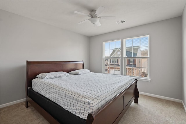 6202 Lenox Ln, South Fayette, PA 15057 - bedroom with light carpet, baseboards, and a ceiling fan