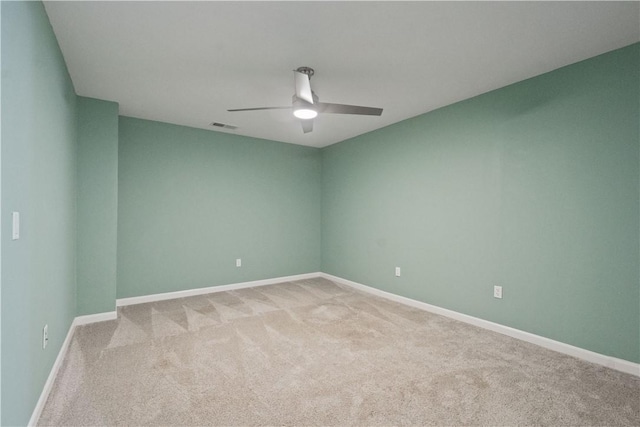 6202 Lenox Ln, South Fayette, PA 15057 - empty room featuring a ceiling fan, light carpet, and baseboards