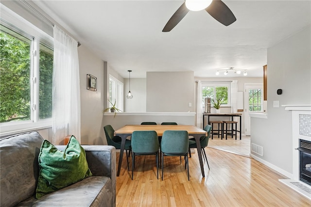 244 Burch Dr, Coraopolis, PA 15108 - dining space with ceiling fan, light wood-style floors, and baseboards