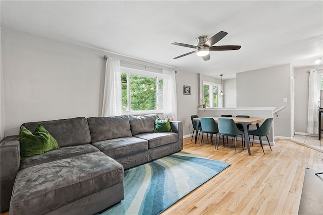 244 Burch Dr, Coraopolis, PA 15108 - living area featuring ceiling fan, wood finished floors, and baseboards