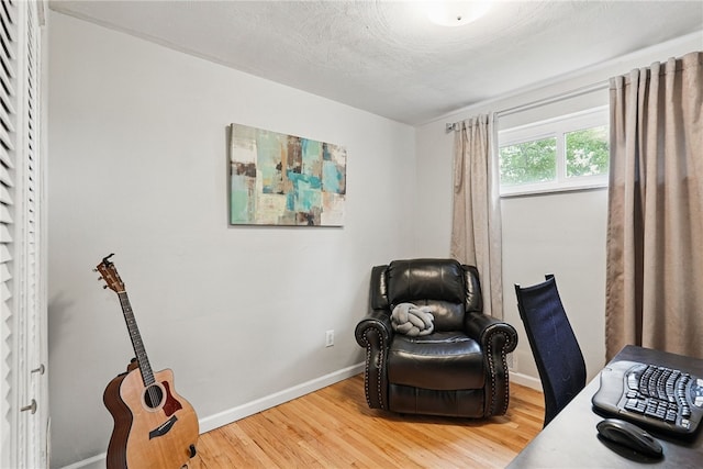 244 Burch Dr, Coraopolis, PA 15108 - living area with light wood-style floors, baseboards, and an office area