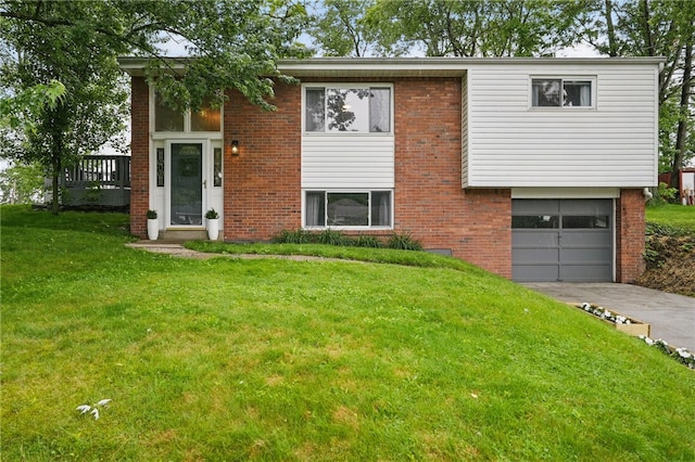 244 Burch Dr, Coraopolis, PA 15108 - view of front facade featuring driveway, brick siding, a garage, and a front yard
