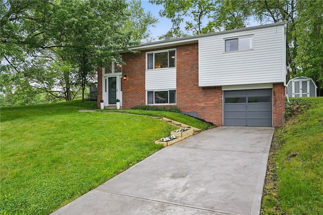 244 Burch Dr, Coraopolis, PA 15108 - view of front facade featuring driveway, an attached garage, a front yard, and brick siding
