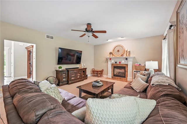 2104 Pierce Bluffs Dr, Hermitage, PA 16148 - living area featuring a ceiling fan, a fireplace, and baseboards