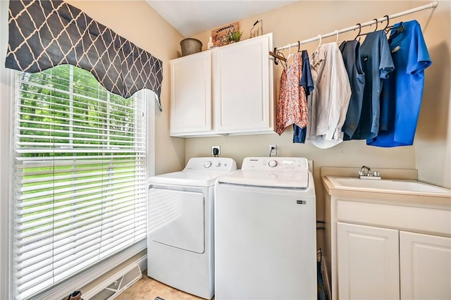 2104 Pierce Bluffs Dr, Hermitage, PA 16148 - laundry area with washing machine and dryer and cabinet space