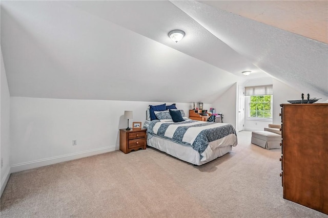 2104 Pierce Bluffs Dr, Hermitage, PA 16148 - bedroom featuring carpet, vaulted ceiling, baseboards, and a textured ceiling
