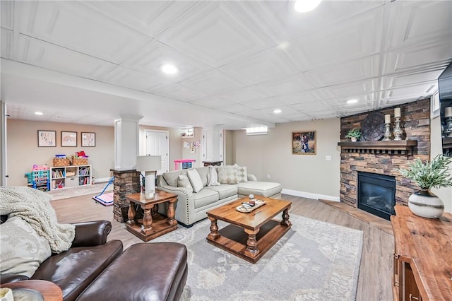 2104 Pierce Bluffs Dr, Hermitage, PA 16148 - living room with wood finished floors, a fireplace, baseboards, and recessed lighting