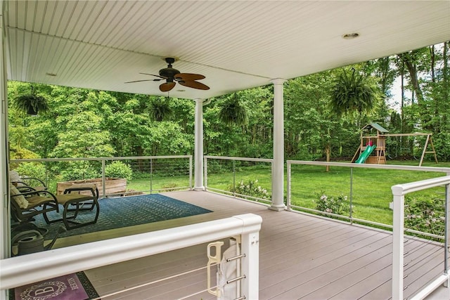 2104 Pierce Bluffs Dr, Hermitage, PA 16148 - wooden deck featuring ceiling fan, a lawn, and a playground