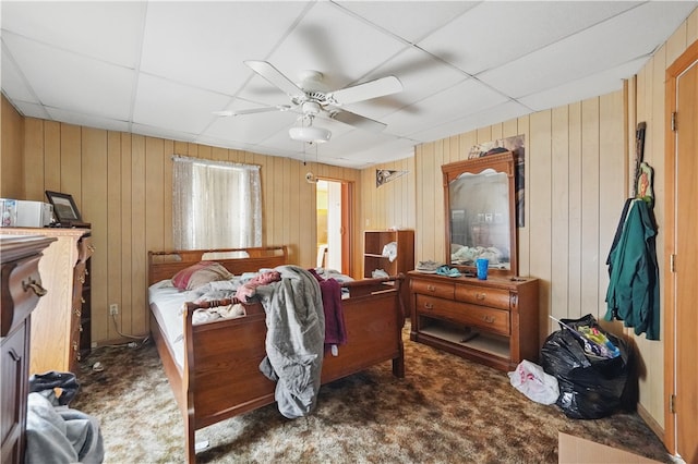 310 Main St, Belle Vernon Fay, PA 15012 - carpeted bedroom with a drop ceiling, wood walls, and a ceiling fan