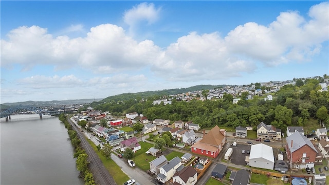 310 Main St, Belle Vernon Fay, PA 15012 - aerial overview of property's location featuring nearby suburban area, a notable bridge, and a large body of water