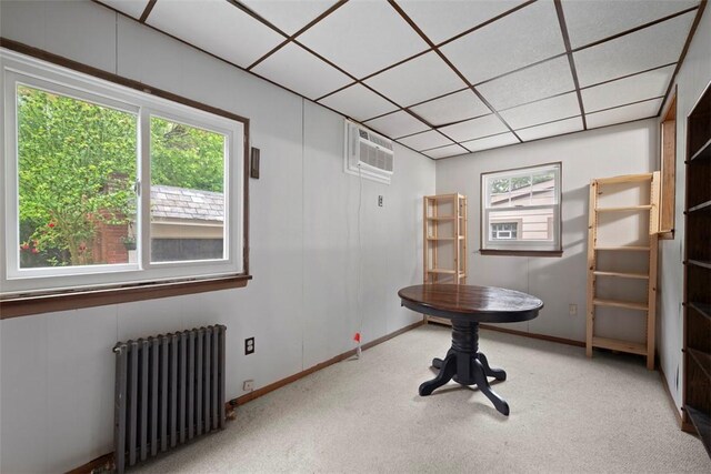 446 S Dallas Ave, Point Breeze, PA 15208 - carpeted empty room featuring radiator, baseboards, and an AC wall unit
