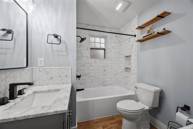 446 S Dallas Ave, Point Breeze, PA 15208 - bathroom featuring toilet, vanity, bathtub / shower combination, and wood finish floors