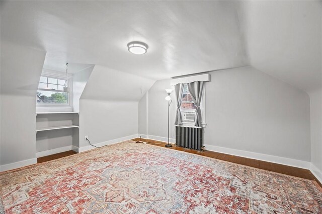 446 S Dallas Ave, Point Breeze, PA 15208 - additional living space featuring lofted ceiling, baseboards, and wood finished floors