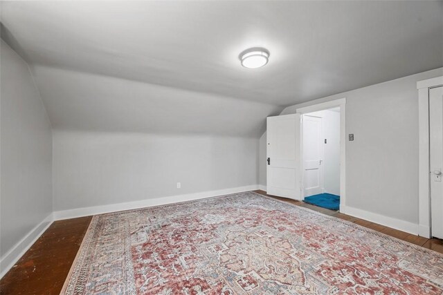446 S Dallas Ave, Point Breeze, PA 15208 - additional living space with lofted ceiling, baseboards, and wood finished floors