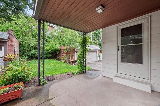 446 S Dallas Ave, Point Breeze, PA 15208 - view of patio / terrace featuring an outbuilding and a garage