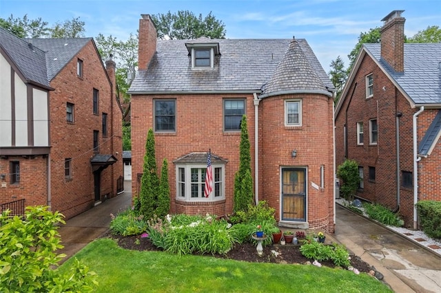 446 S Dallas Ave, Point Breeze, PA 15208 - english style home with a high end roof, a chimney, and brick siding
