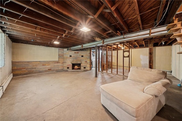 954 Illinois Ave, Braddock Hills, PA 15221 - basement featuring a large fireplace and a baseboard heating unit
