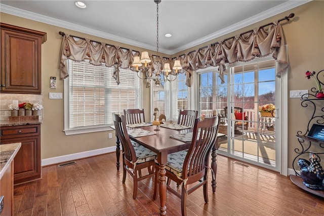 361 Patriot Ln, Economy, PA 15042 - dining space with baseboards, ornamental molding, wood-type flooring, a chandelier, and recessed lighting