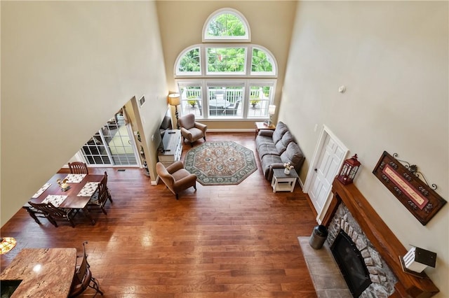 361 Patriot Ln, Economy, PA 15042 - living room featuring a fireplace, hardwood / wood-style floors, and a high ceiling