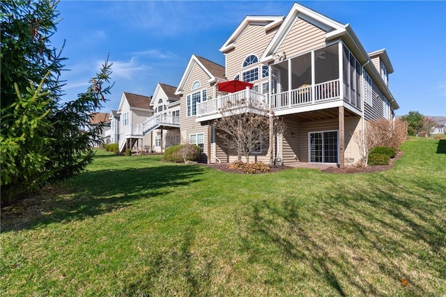 361 Patriot Ln, Economy, PA 15042 - back of house featuring a sunroom, a yard, and a wooden deck