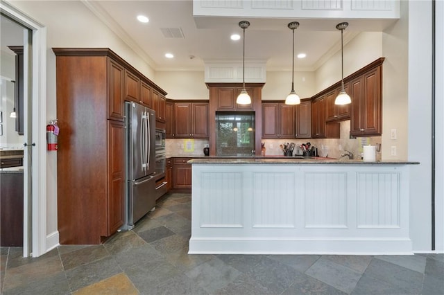 361 Patriot Ln, Economy, PA 15042 - kitchen with appliances with stainless steel finishes, a peninsula, decorative backsplash, pendant lighting, and ornamental molding