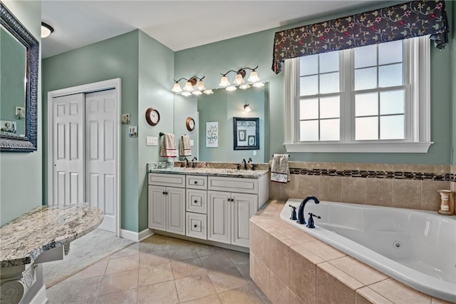361 Patriot Ln, Economy, PA 15042 - full bath featuring a whirlpool tub, double vanity, and tile patterned flooring