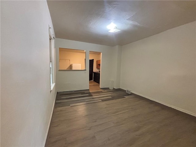 7707-7708-7710 Forest Way, Homewood-Brushton, PA 15208 - empty room featuring baseboards and wood finished floors