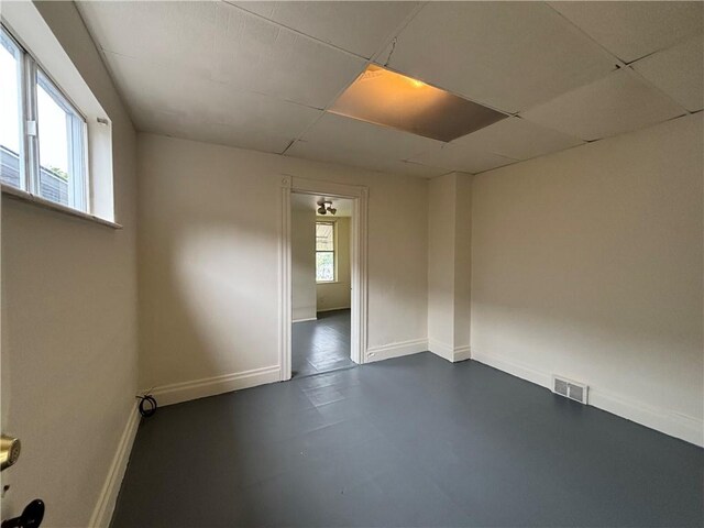 7707-7708-7710 Forest Way, Homewood-Brushton, PA 15208 - empty room with a paneled ceiling and baseboards