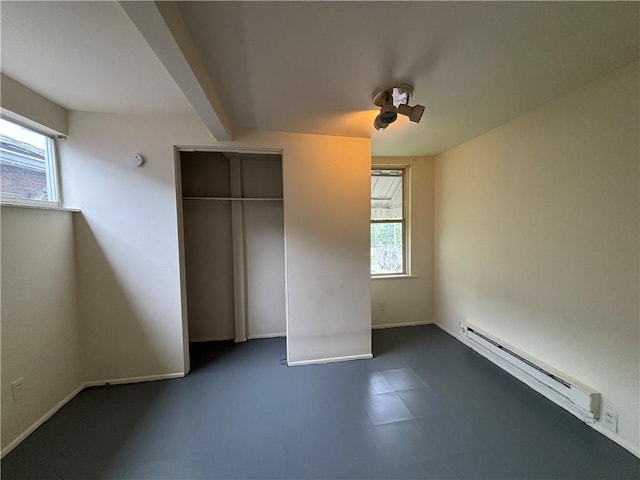 7707-7708-7710 Forest Way, Homewood-Brushton, PA 15208 - unfurnished bedroom with a baseboard heating unit, a closet, baseboards, and a ceiling fan