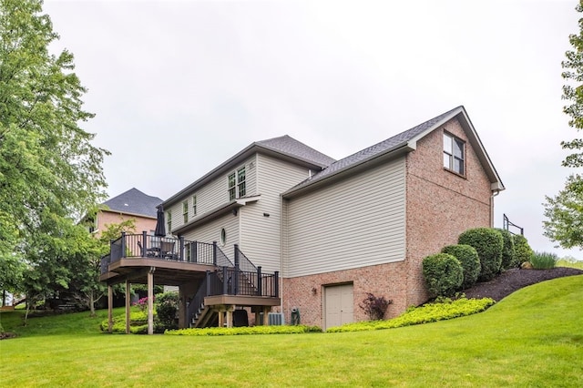 104 Southridge Dr, Cranberry Twp, PA 16066 - rear view of house featuring stairway, a wooden deck, brick siding, and a yard