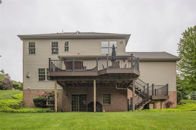 104 Southridge Dr, Cranberry Twp, PA 16066 - rear view of house featuring brick siding, a deck, a lawn, and stairway