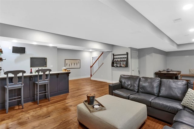 104 Southridge Dr, Cranberry Twp, PA 16066 - living room with recessed lighting, stairway, wood finished floors, a dry bar, and baseboards