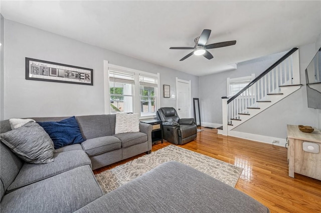 510 Central Ave E, Washington Boro, PA 15301 - living room featuring stairway, wood finished floors, a ceiling fan, and baseboards