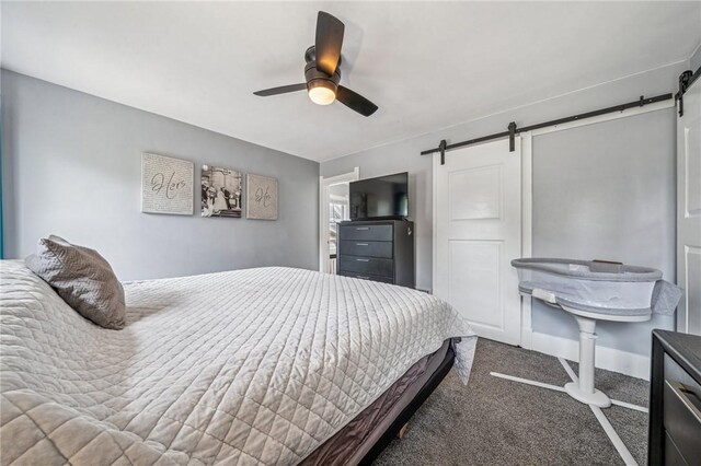 510 Central Ave E, Washington Boro, PA 15301 - bedroom featuring a barn door, carpet floors, and ceiling fan