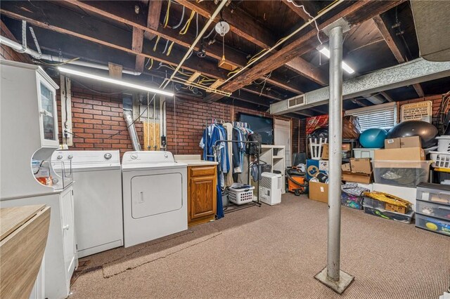 510 Central Ave E, Washington Boro, PA 15301 - unfinished basement featuring washing machine and dryer, brick wall, and carpet