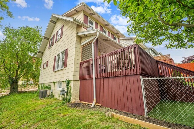510 Central Ave E, Washington Boro, PA 15301 - view of property exterior featuring central AC, a yard, and a wooden deck
