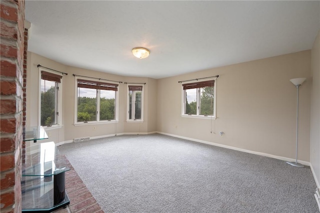 302 Shutt Rd, Hempfield Twp Wml, PA 15601 - unfurnished living room featuring carpet and baseboards