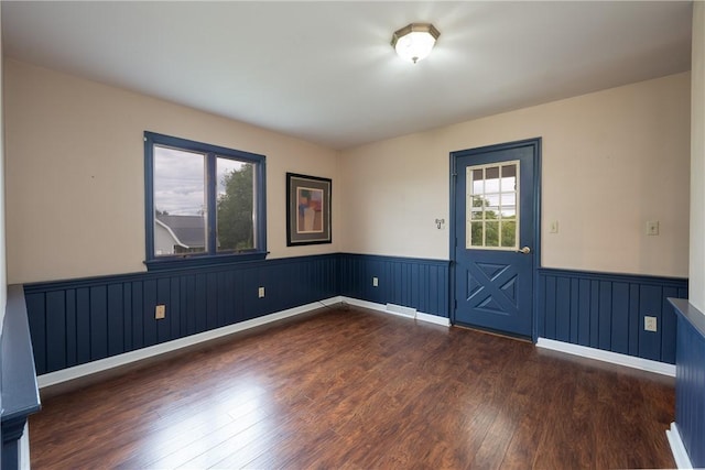 302 Shutt Rd, Hempfield Twp Wml, PA 15601 - unfurnished room featuring dark wood-type flooring and a wainscoted wall