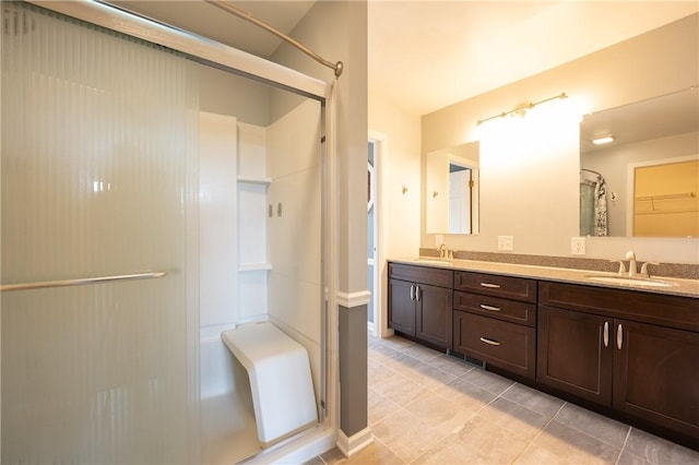 302 Shutt Rd, Hempfield Twp Wml, PA 15601 - full bath with a stall shower, double vanity, and tile patterned flooring