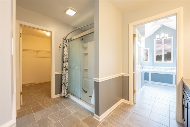 302 Shutt Rd, Hempfield Twp Wml, PA 15601 - bathroom featuring a shower stall, a chandelier, a walk in closet, tile patterned floors, and vanity