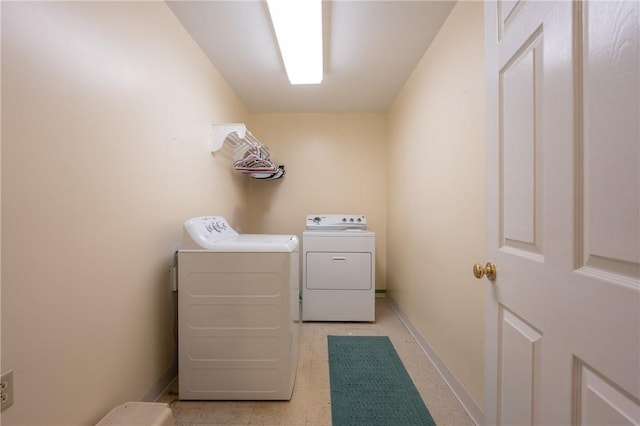 302 Shutt Rd, Hempfield Twp Wml, PA 15601 - washroom with separate washer and dryer and baseboards