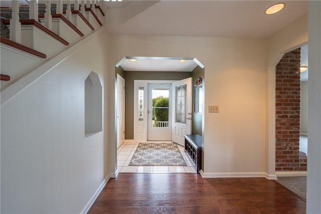 302 Shutt Rd, Hempfield Twp Wml, PA 15601 - entrance foyer with wood finished floors, baseboards, and stairway