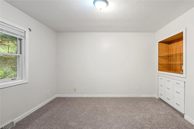 547 Mercer Rd, Twp Of But Ne, PA 16001 - carpeted spare room with a textured ceiling and baseboards