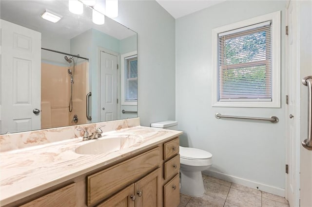 547 Mercer Rd, Twp Of But Ne, PA 16001 - bathroom with vanity, toilet, a shower, tile patterned flooring, and baseboards