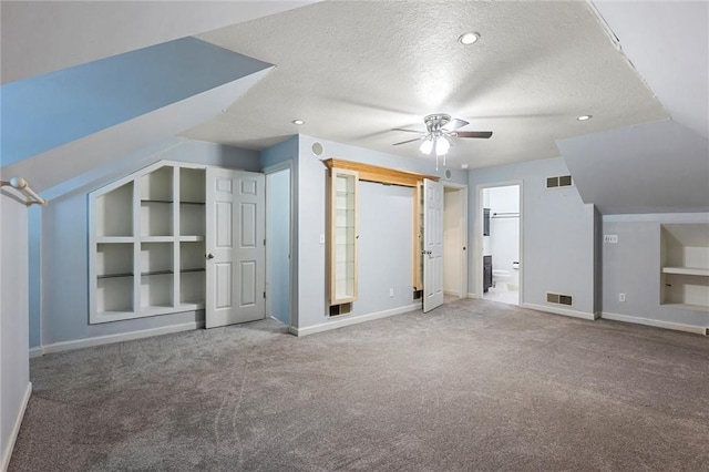 547 Mercer Rd, Twp Of But Ne, PA 16001 - additional living space with built in features, baseboards, a textured ceiling, carpet floors, and ceiling fan