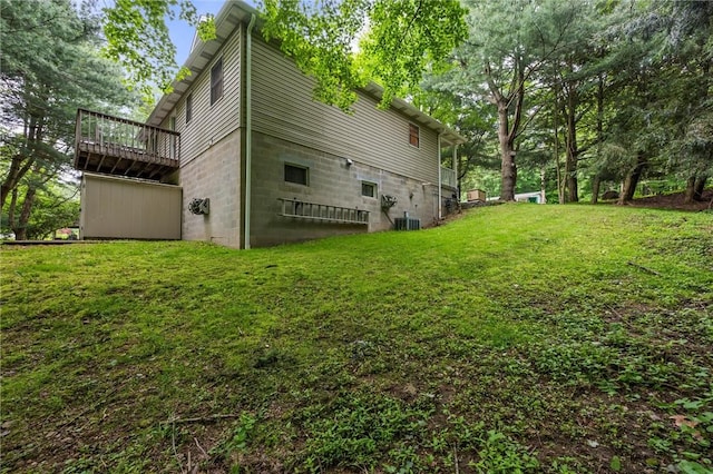 547 Mercer Rd, Twp Of But Ne, PA 16001 - view of side of home with cooling unit, a lawn, and a wooden deck