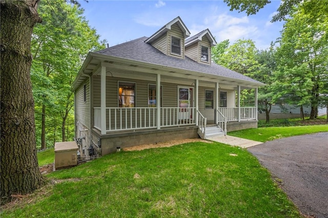 547 Mercer Rd, Twp Of But Ne, PA 16001 - view of front of property featuring covered porch, a shingled roof, and a front yard