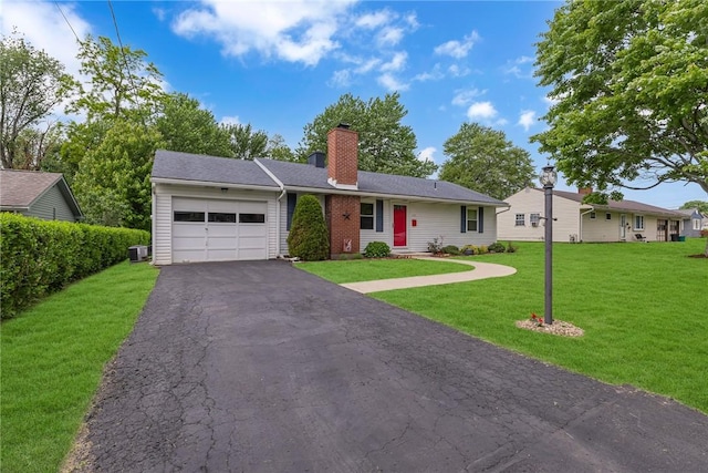 125 Spruce St, Brighton Twp, PA 15009 - ranch-style home featuring an attached garage, a chimney, asphalt driveway, and a front yard