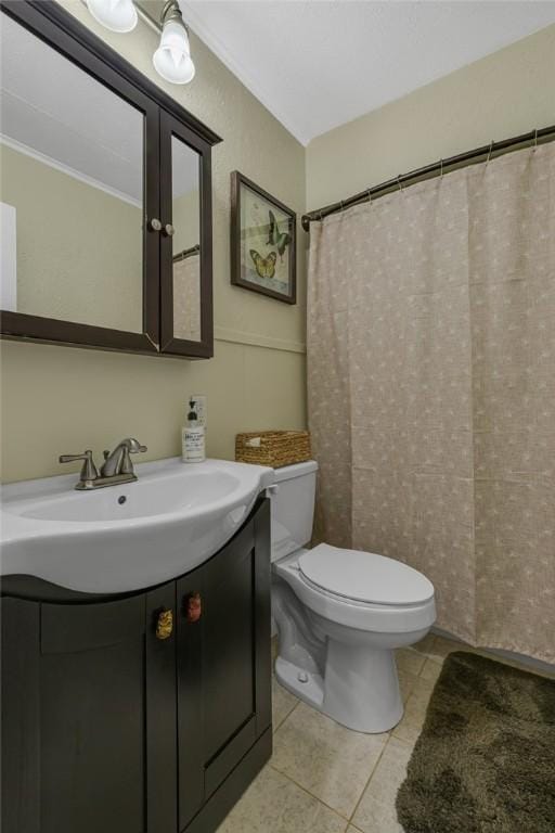 125 Spruce St, Brighton Twp, PA 15009 - full bath featuring tile patterned flooring, toilet, vanity, and a shower with shower curtain